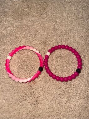 Lokai pink bracelets